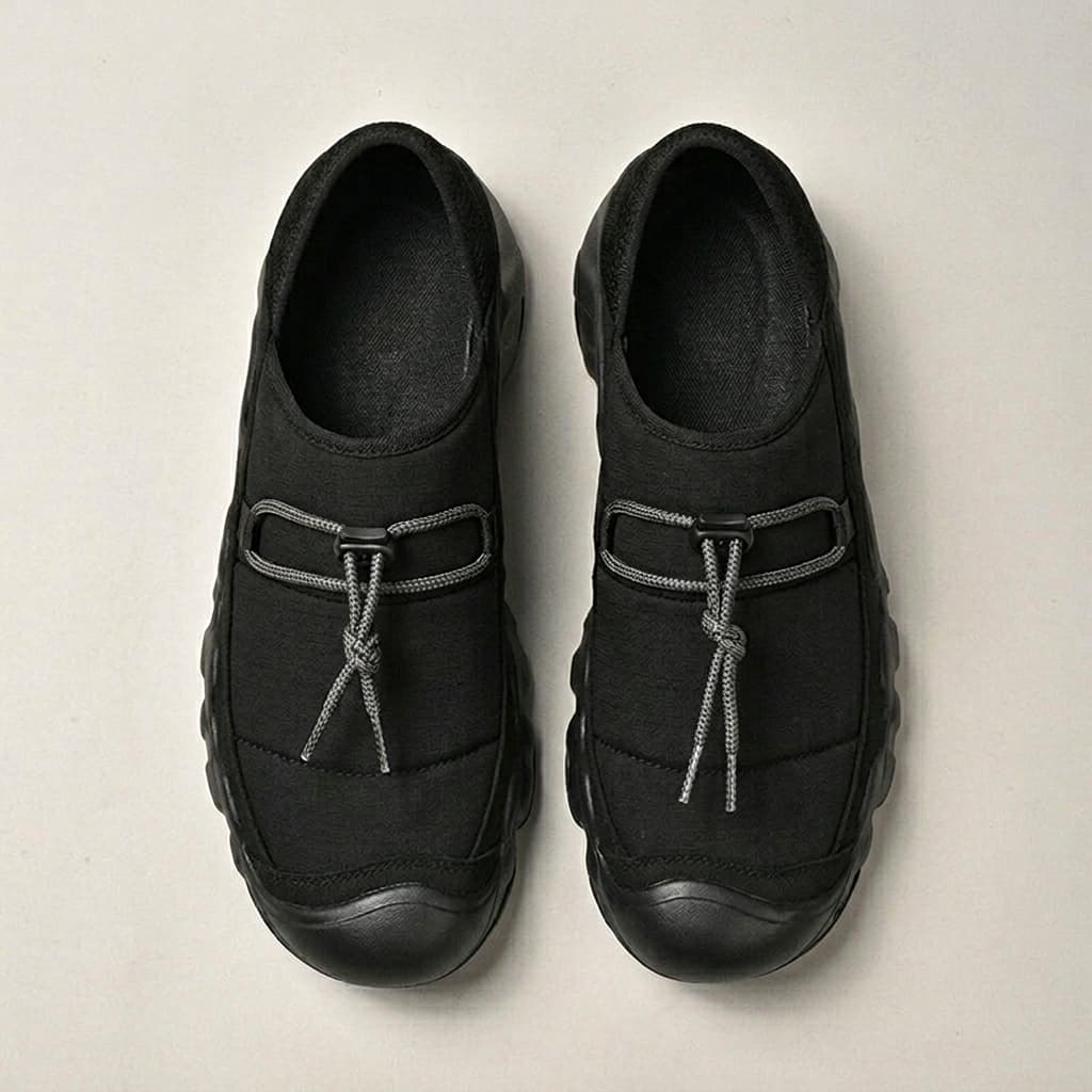 Amos Canvas Sneakers — premium cushioned slip-on with bungee toggle and lugged sole