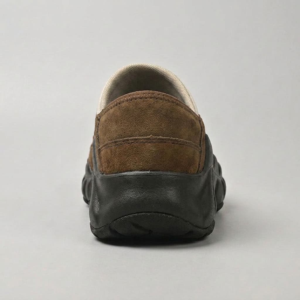 Amos Canvas Sneakers — premium cushioned slip-on with bungee toggle and lugged sole