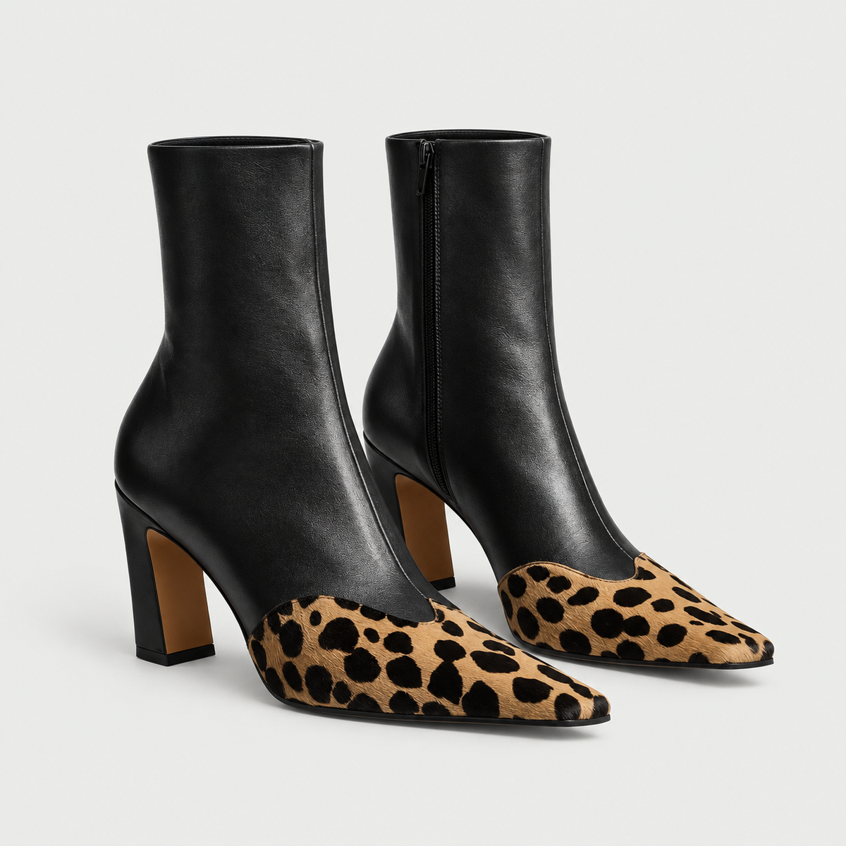 Amelia Pointed Boots — women's leather ankle boots with a contrast pointed toe and sculpted heel