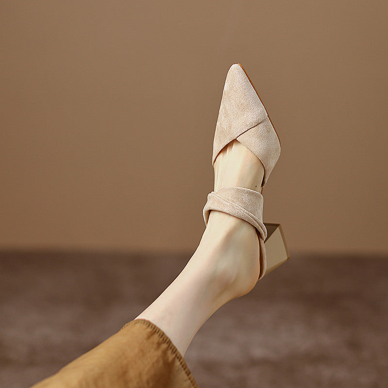 Thea Knotted Mules in Beige — side view on model