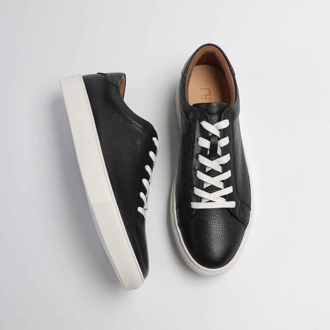 Carter Court Sneakers in Black — side profile of the low-top pair