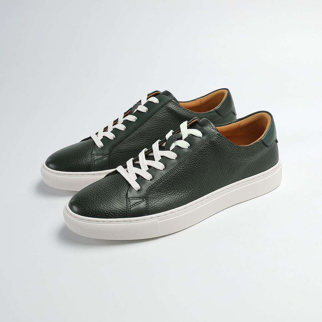 Carter Court Sneakers in Dark Green — three-quarter view of the pebbled leather pair