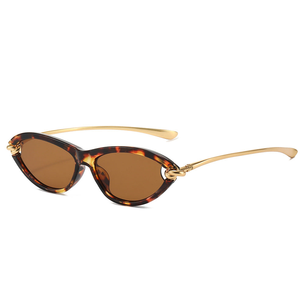 Paloma Sunglasses in Leopard — glossy cat-eye sunglasses with gold-knot temples