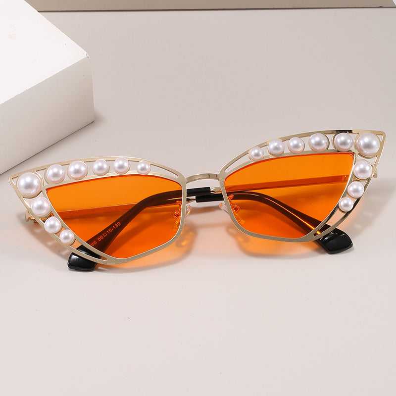 Liliana Pearl Sunglasses in Orange — cat-eye frame with pearl accents
