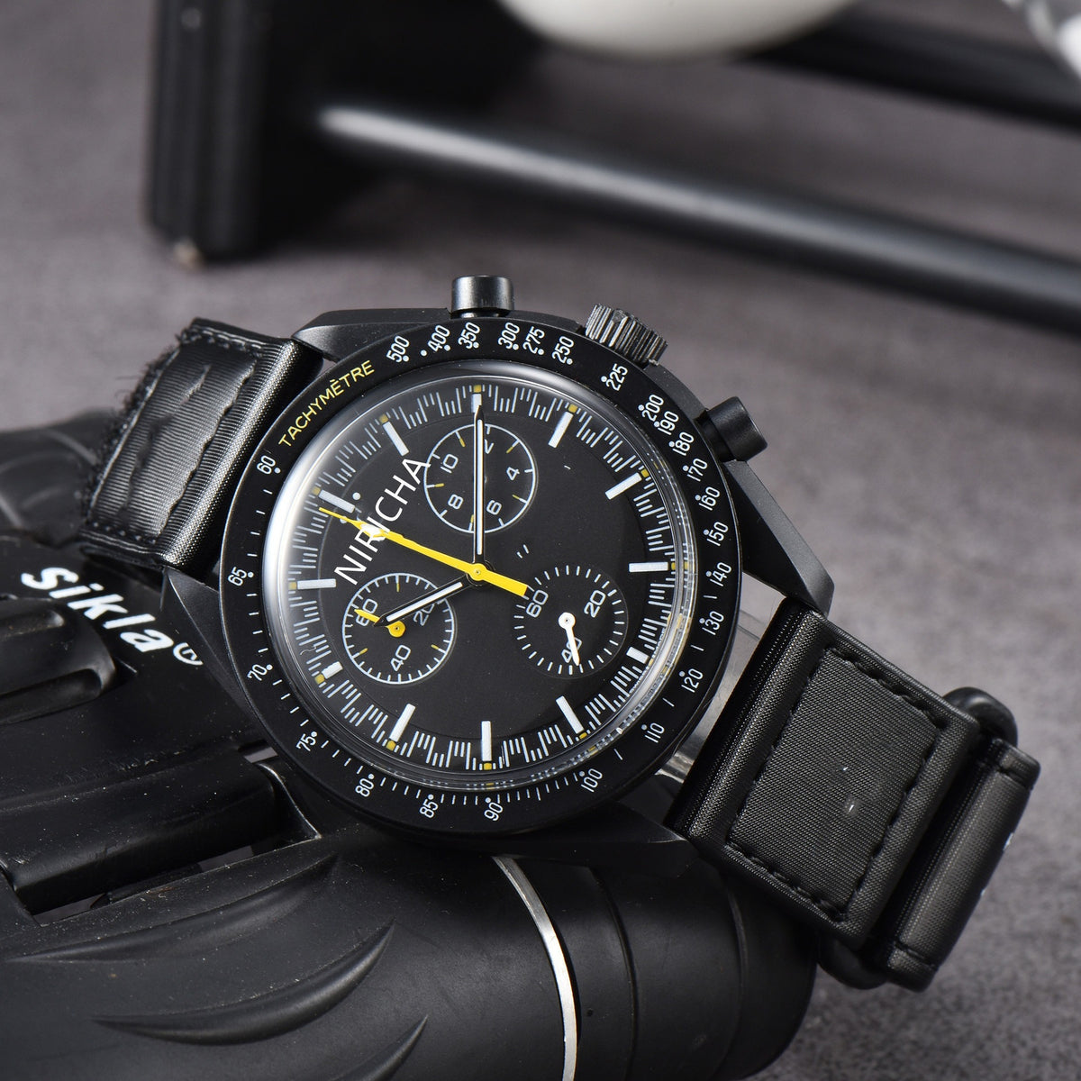 Cruz Chronograph Watch in Black — Swiss quartz chronograph with tachymètre bezel and triple sub-dials