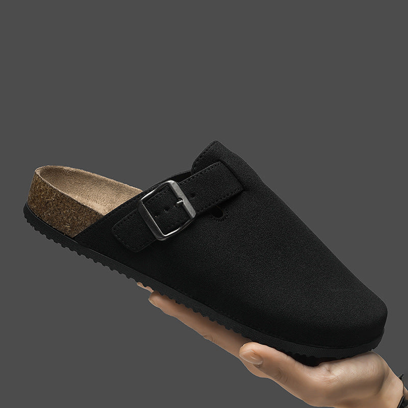 Nico Suede Clogs in Black — side view, cork footbed backless clog