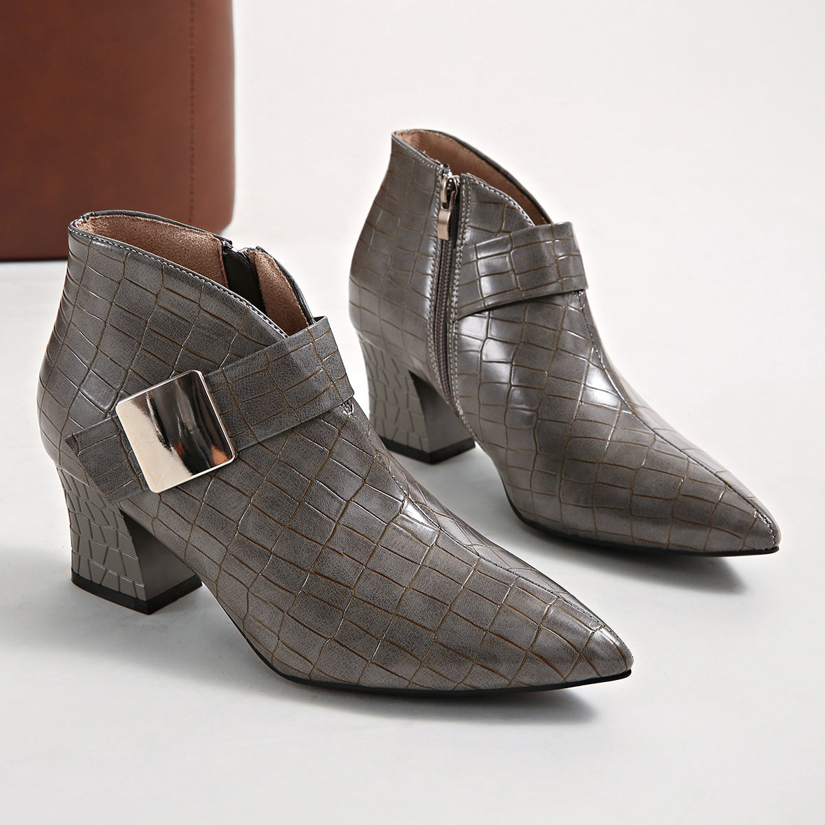 Scarlett Pointed Boots in Gray — croc-textured pointed ankle boots with a square buckle plate