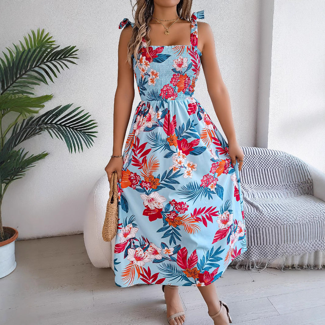 Marisol Floral Dress in Light Blue — tropical floral midi with smocked bodice