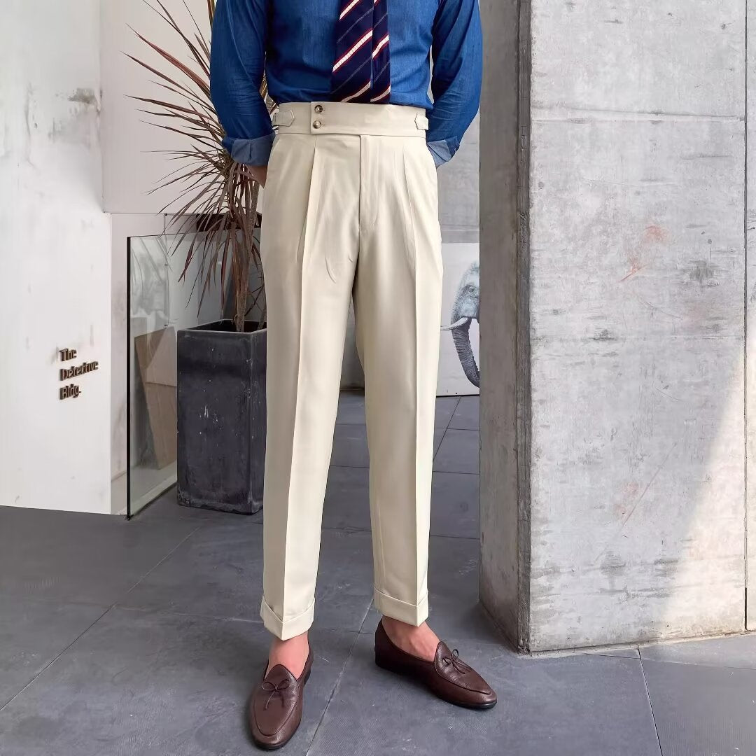 Matteo Pleated Trousers in Cream — high-rise dress trousers with double pleats and side tabs