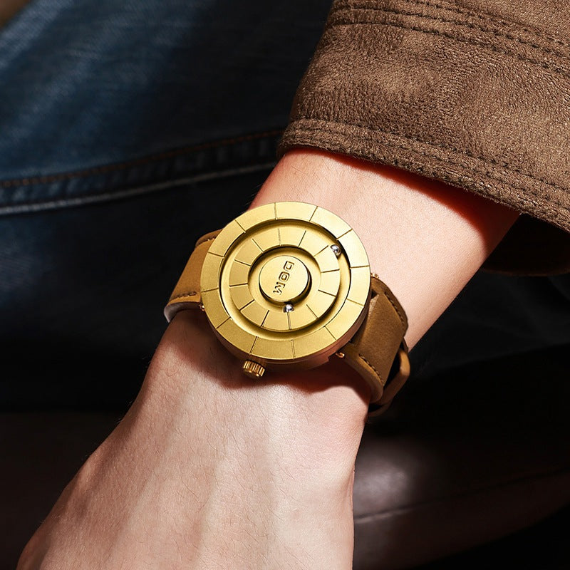 Dom Orbit Watch in Gold — worn on the wrist showing the hand-free dial