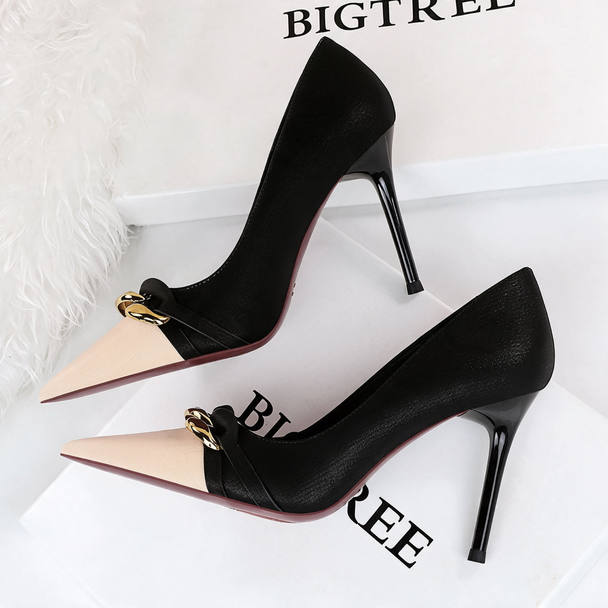 Perla Two-Tone Pumps in Black — front view