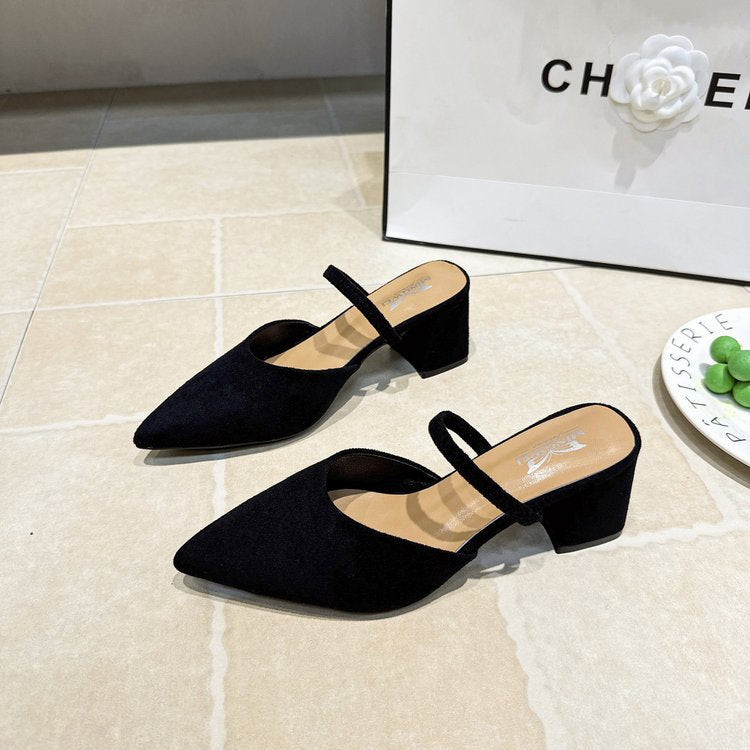 Chloe Pointed Mules in Black — angled view of the pointed toe and slim instep strap