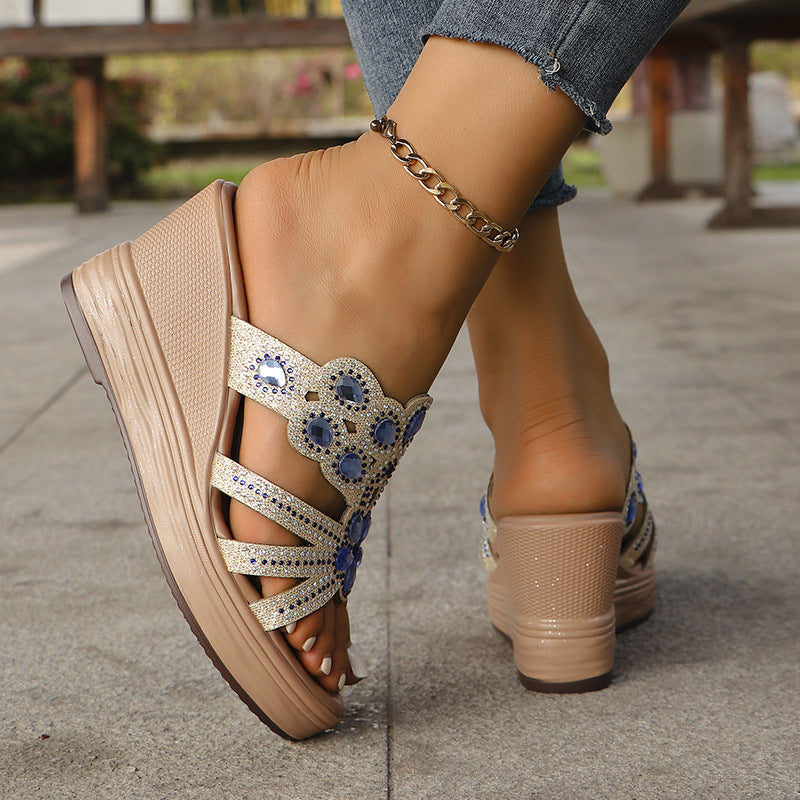 Livia Crystal Sandals in Blue — rhinestone wedge slide with jeweled floral centerpiece