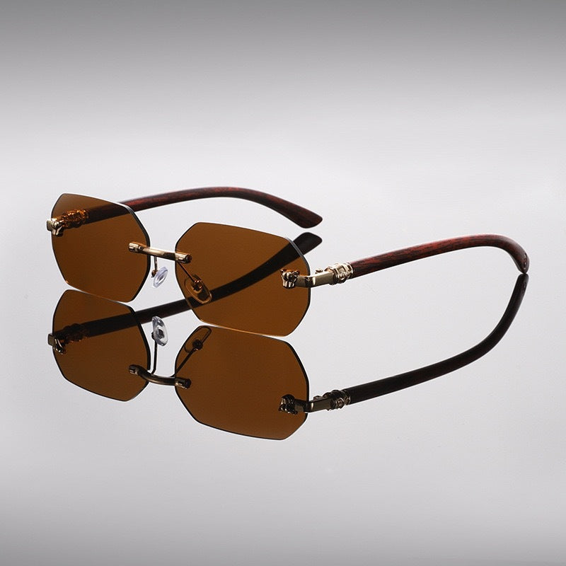 Dax Rimless Sunglasses in Brown — faceted rimless lenses with gold leopard temples