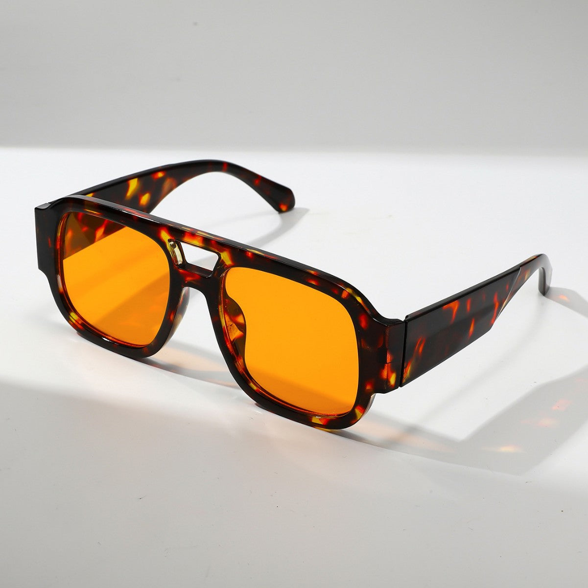 Quinn Retro Sunglasses in Orange — chunky square aviator with keyhole bridge