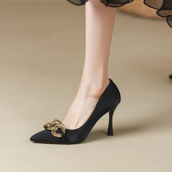 Margaux Chain Heels in Black — worn side view