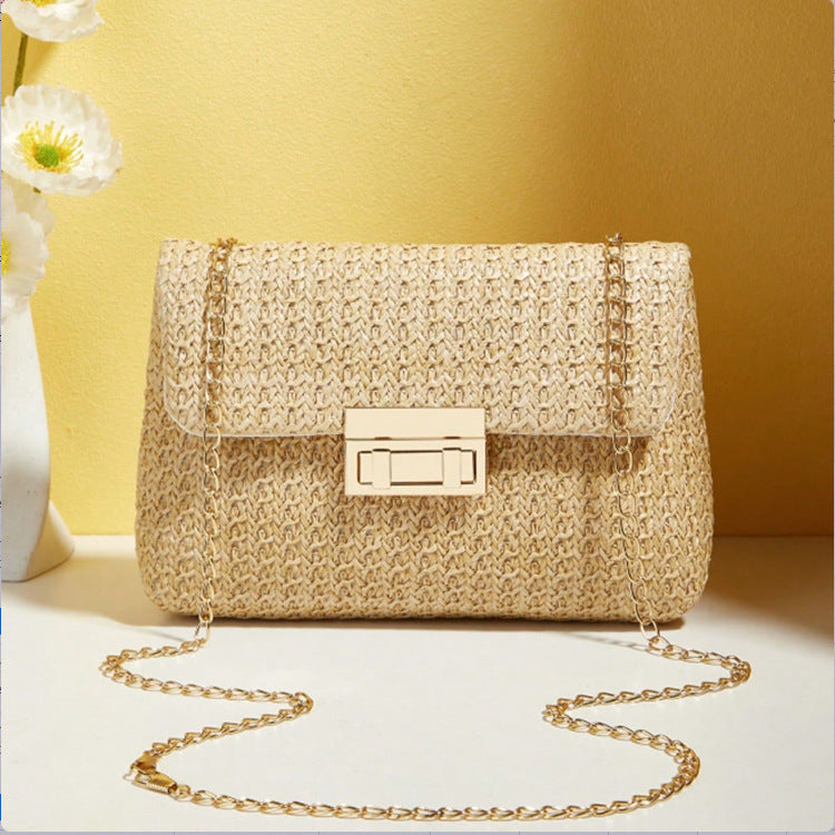 Sienna Woven Handbag in Beige — woven straw crossbody with gold chain strap
