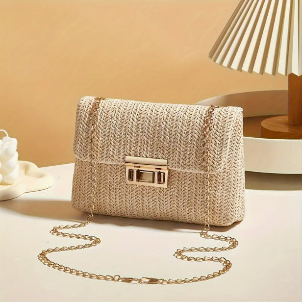 Sienna Woven Handbag in White — woven straw crossbody with gold chain strap