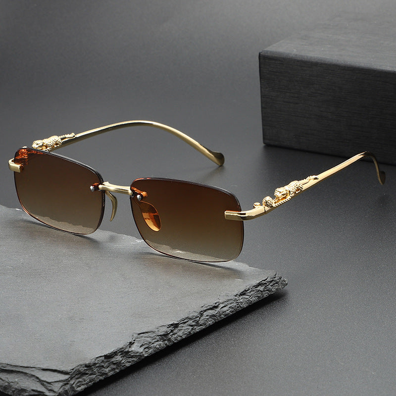 Dante Sunglasses in Brown — rimless frame with gold leopard temples