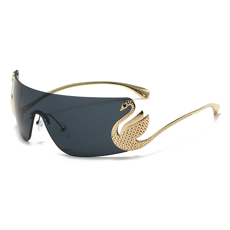 Bianca Sunglasses in Black — gold-tone wraparound with sculpted swan accent
