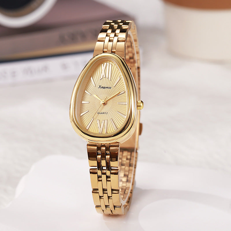 June Bracelet Watch in Gold — petite teardrop dial with slim link bracelet