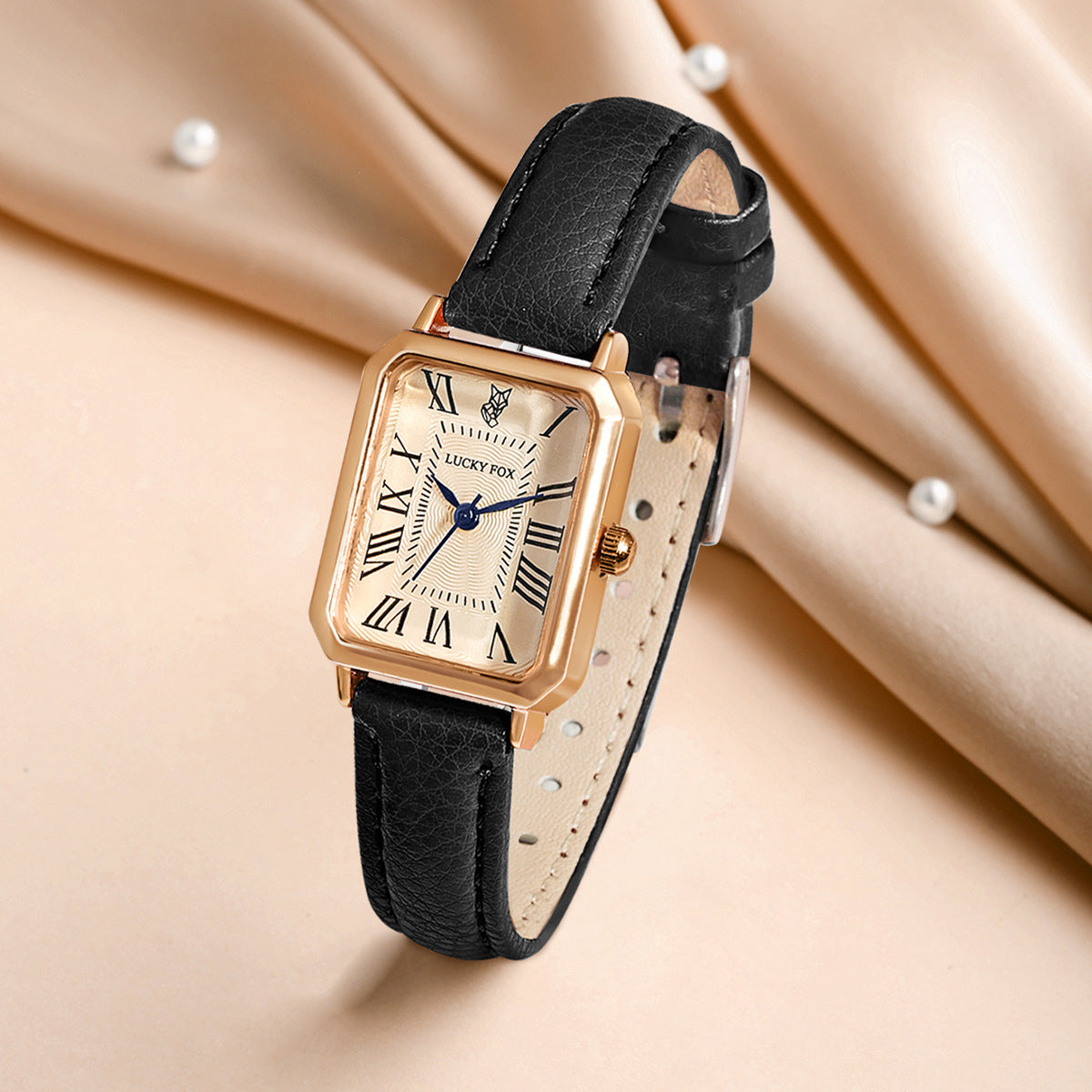 Juliette Vintage Watch in Black — gold-tone rectangle watch with cream Roman-numeral dial
