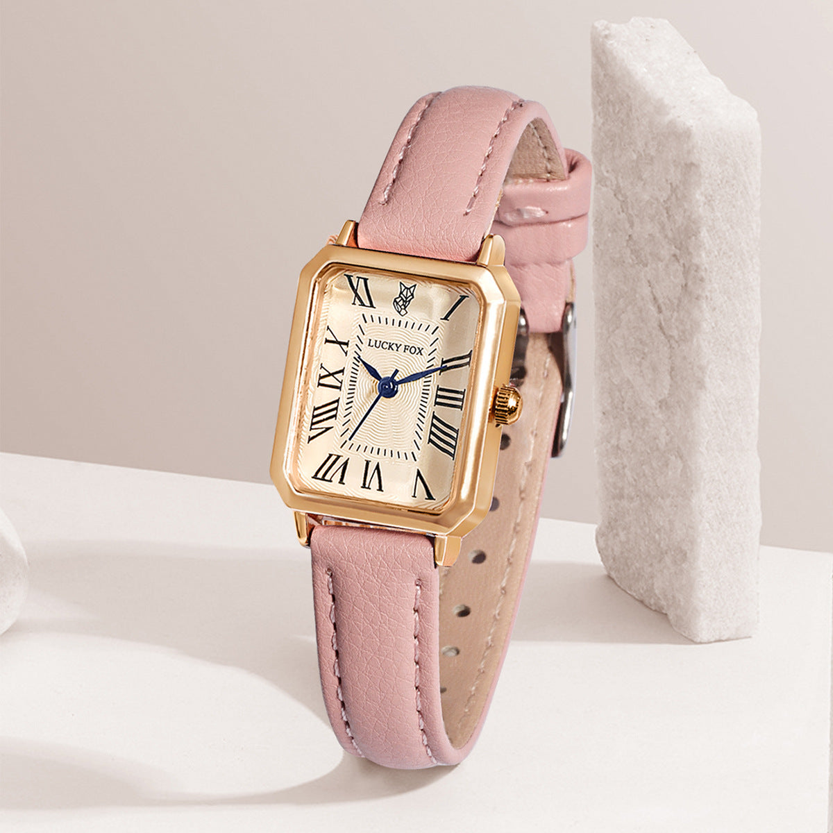 Juliette Vintage Watch in Pink — gold-tone rectangle watch with cream Roman-numeral dial