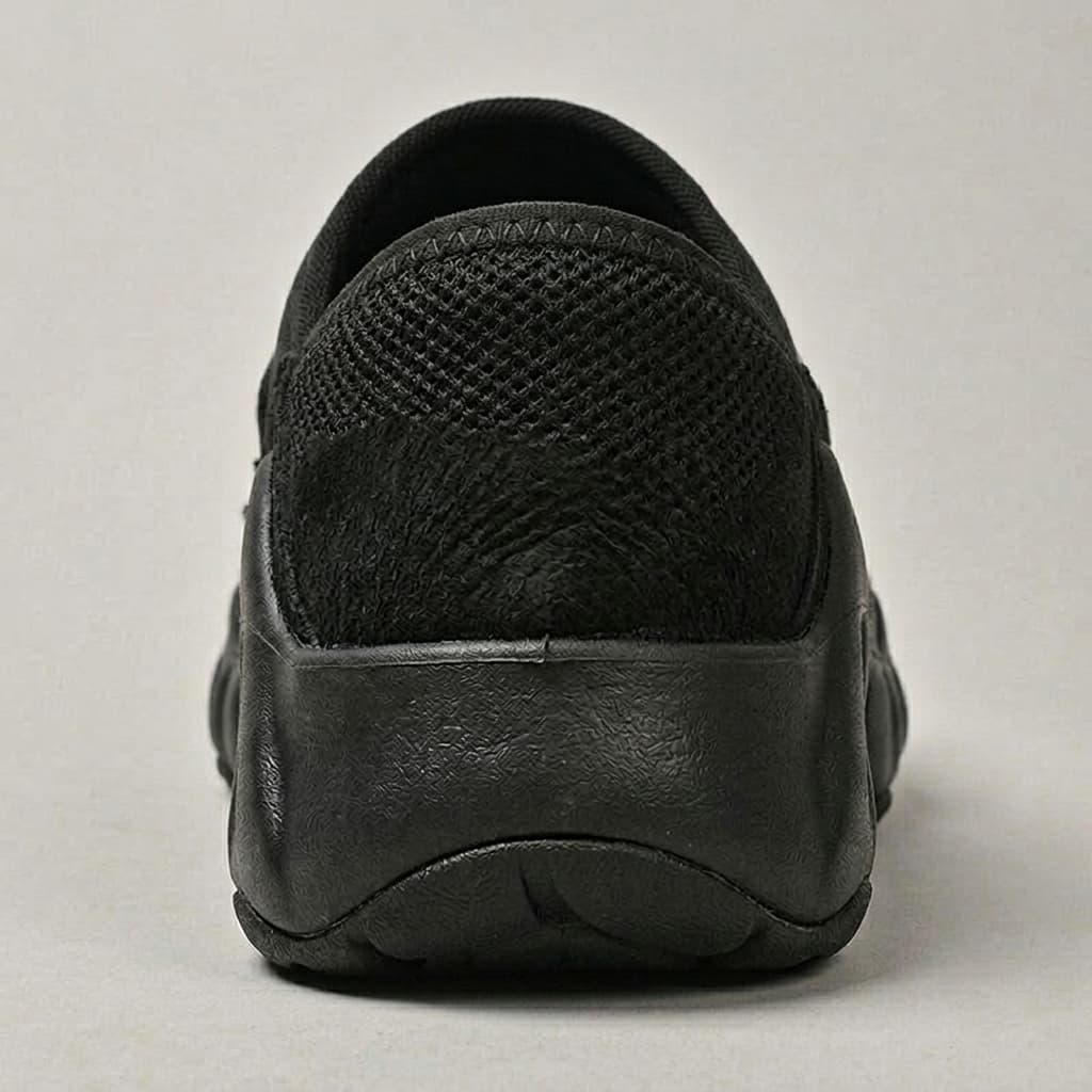 Amos Canvas Sneakers — premium cushioned slip-on with bungee toggle and lugged sole