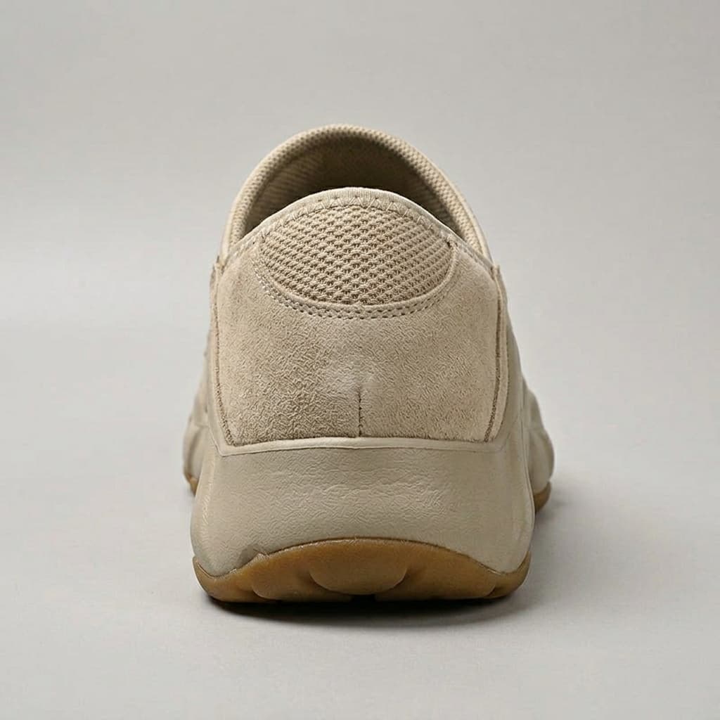 Amos Canvas Sneakers — premium cushioned slip-on with bungee toggle and lugged sole