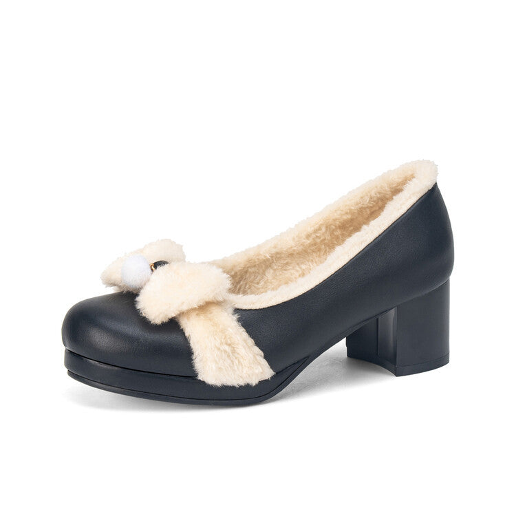 Camille Plush Pumps in Black — plush-lined platform pump with a soft pom bow