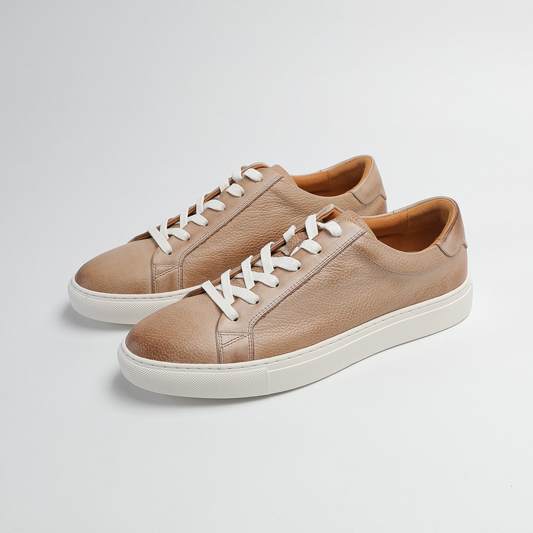 Carter Court Sneakers in Beige — three-quarter view of the pebbled leather pair