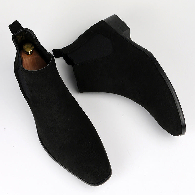 Wade Chelsea Boots in Black — angled pair showing the elastic side panel