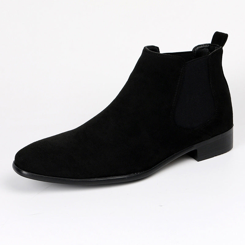 Wade Chelsea Boots in Black — three-quarter view showing the chisel toe and low stacked heel