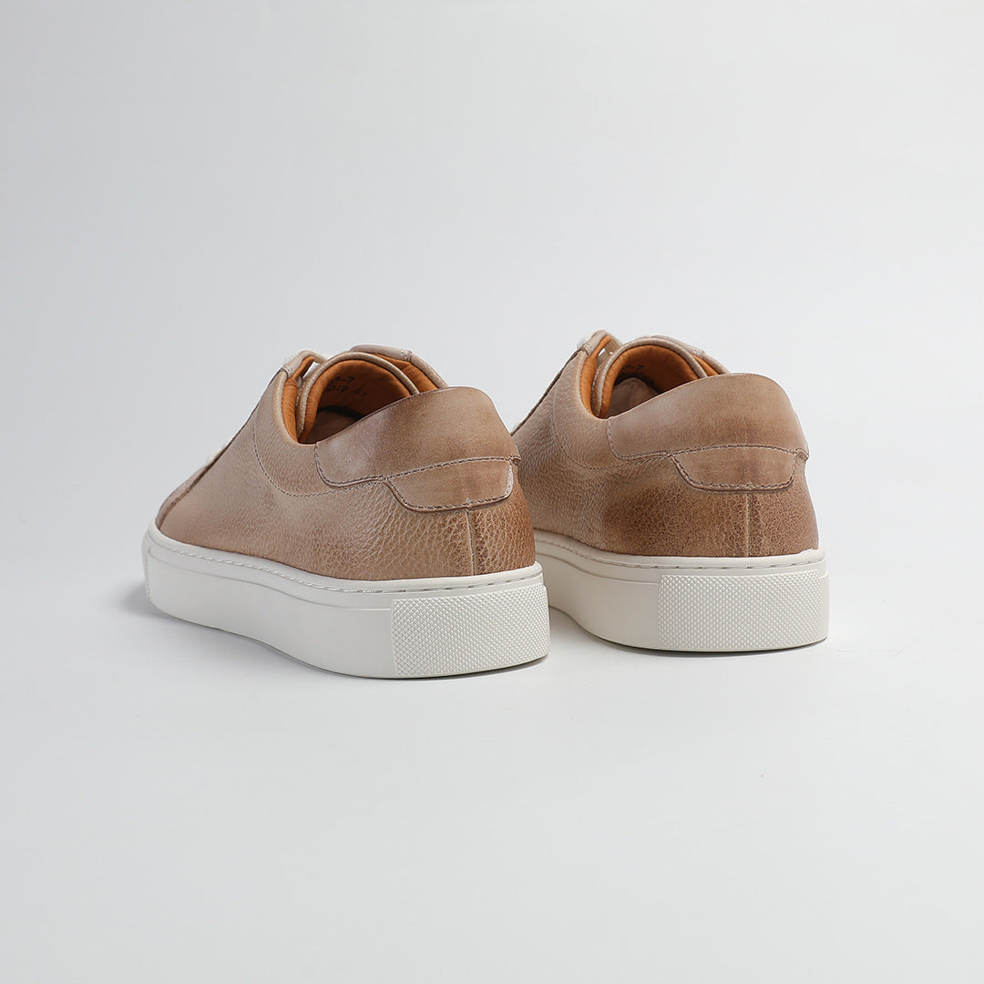 Carter Court Sneakers in Beige — back view showing the heel and padded collar