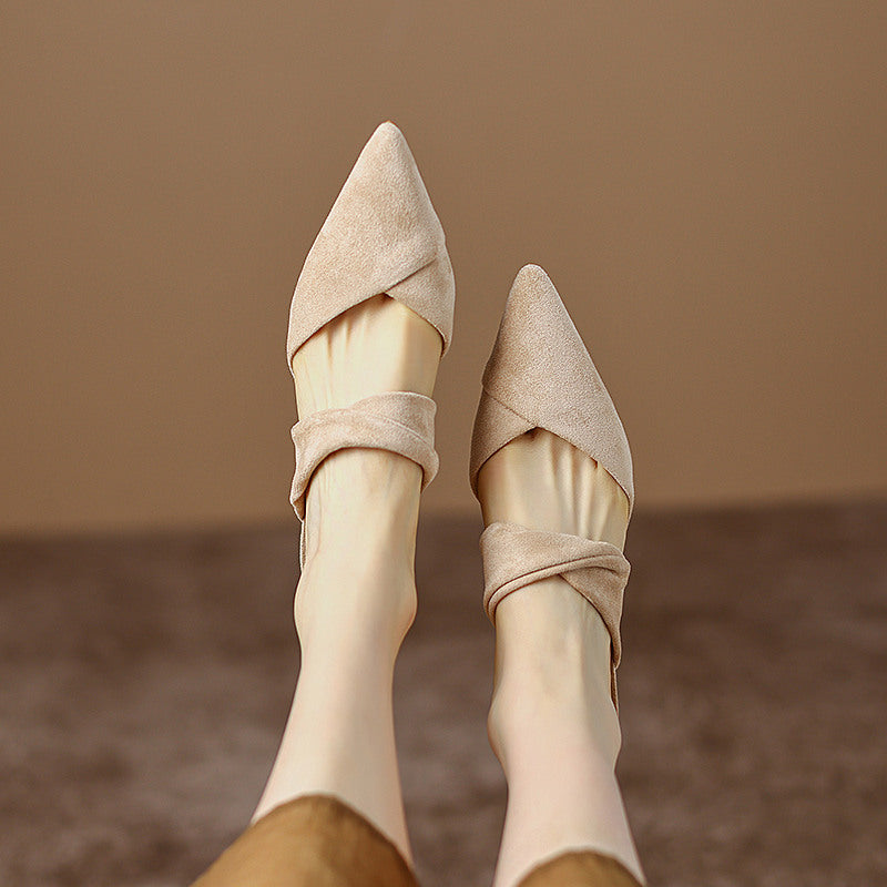 Thea Knotted Mules in Beige — top view on model