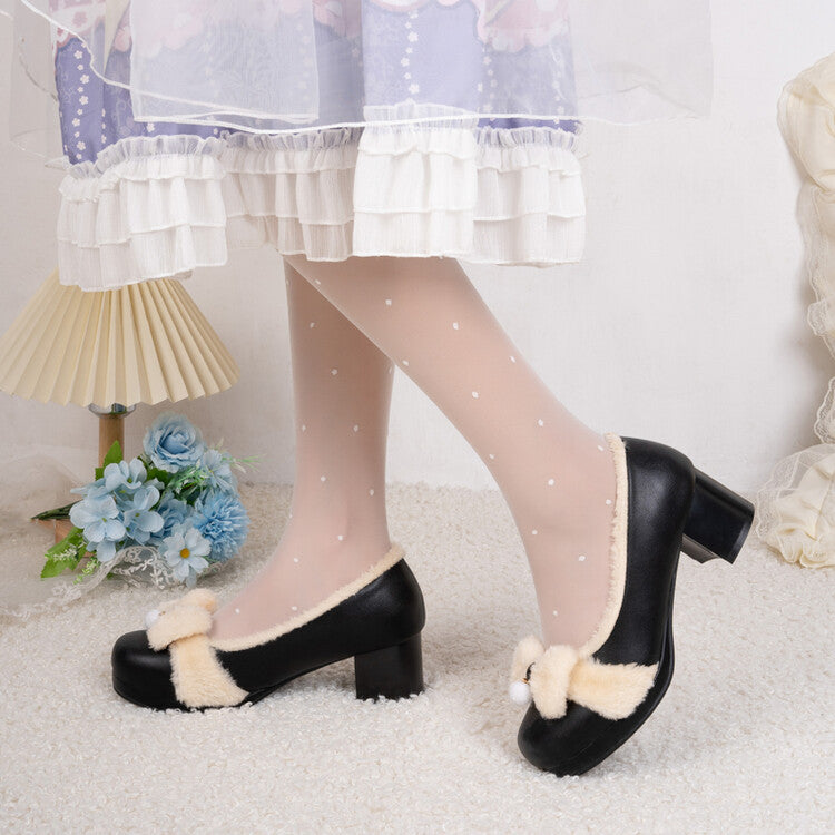 Camille Plush Pumps in Black — worn with sheer socks and a ruffled skirt
