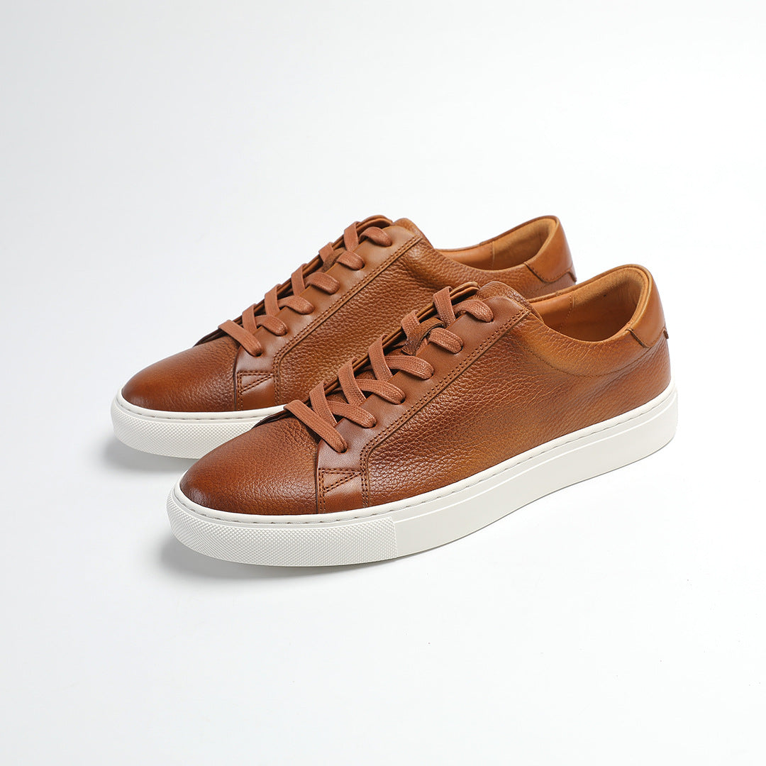 Carter Court Sneakers in Light Brown — three-quarter view of the pebbled leather pair