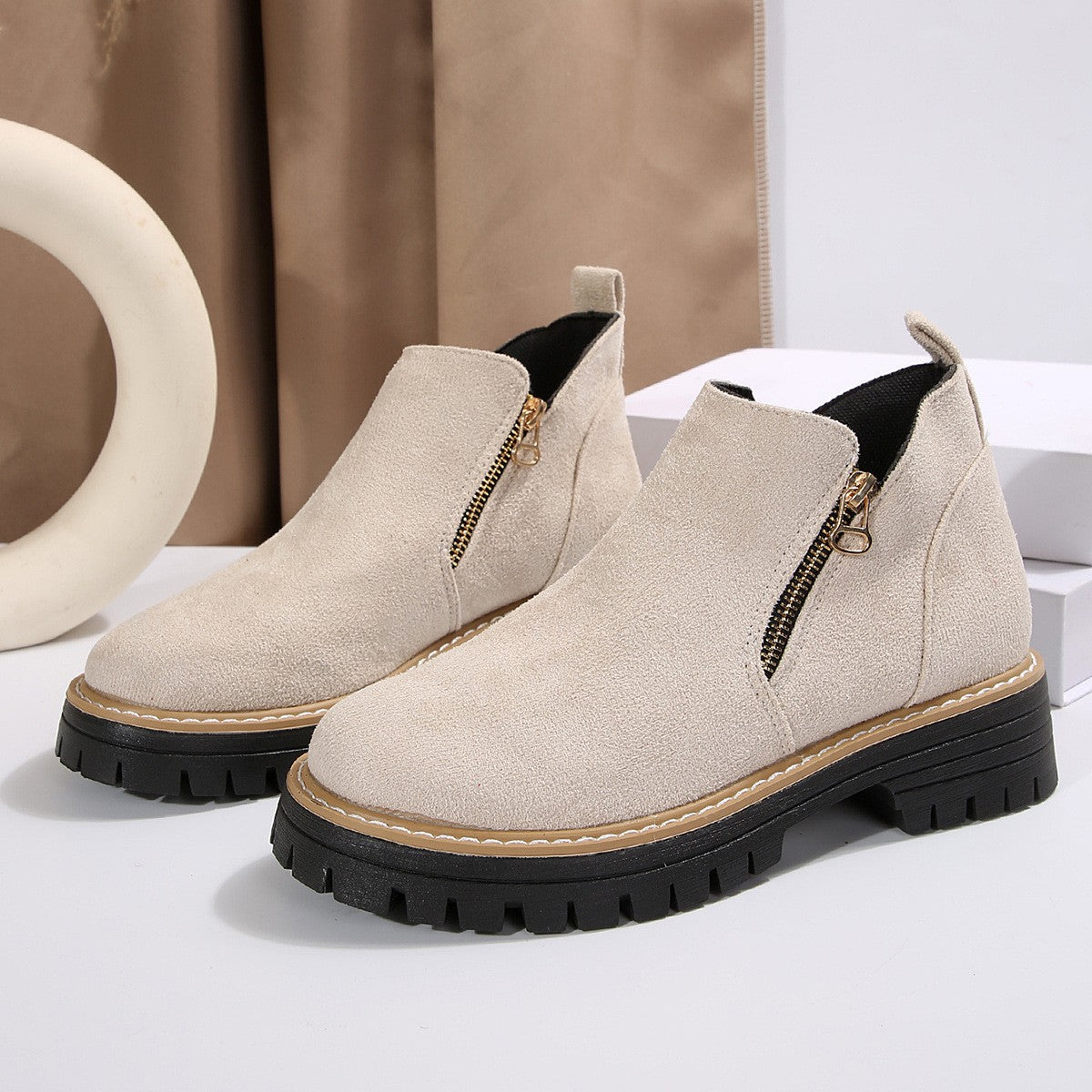 Sage Chunky Boots in Beige — suede lug-sole ankle boot with a gold side zip
