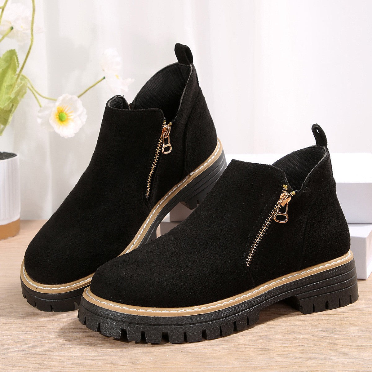 Sage Chunky Boots in Black — suede lug-sole ankle boot with a gold side zip