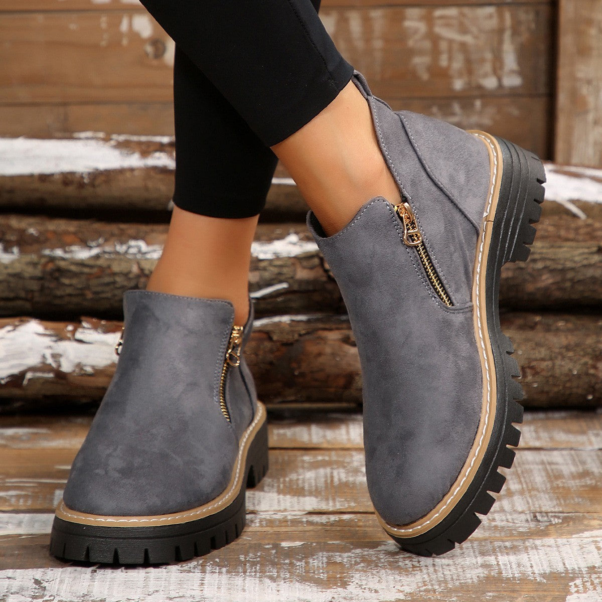 Sage Chunky Boots in Gray — worn on model showing the side zip and platform sole