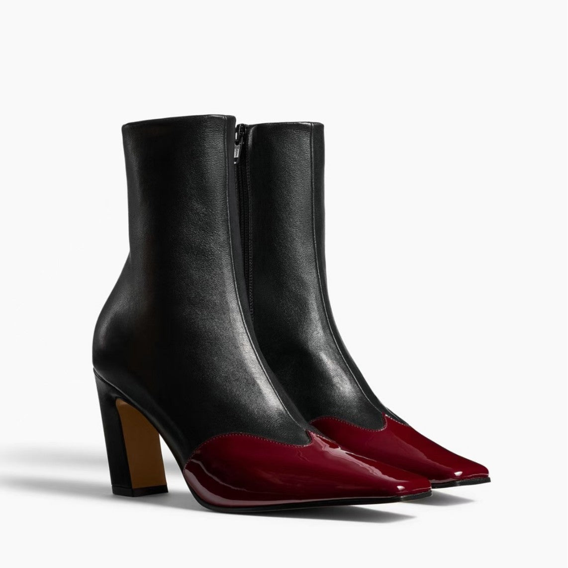 Amelia Pointed Boots in Burgundy — pair shown with the glossy burgundy toe and sculpted heel