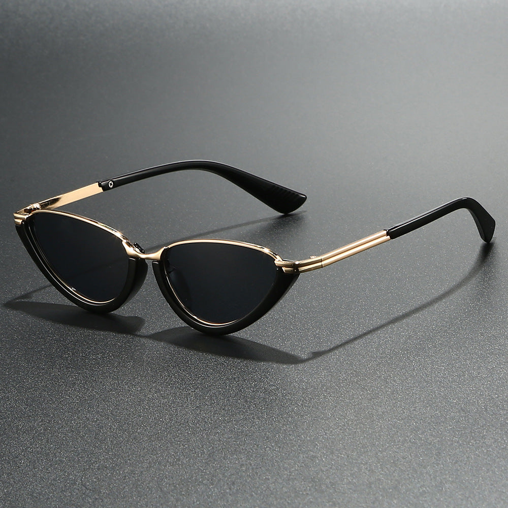 Nadia Cat-Eye Sunglasses in Black — bold retro cat-eye sunglasses with gold-tone top bar