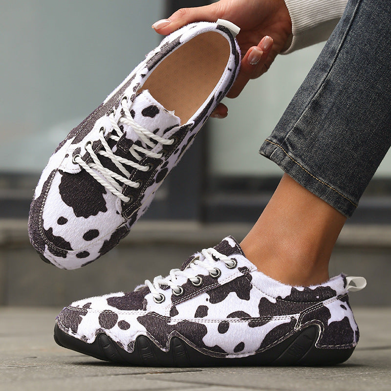Bea Court Sneakers in Black cow print — lace-up sneaker with cushioned footbed