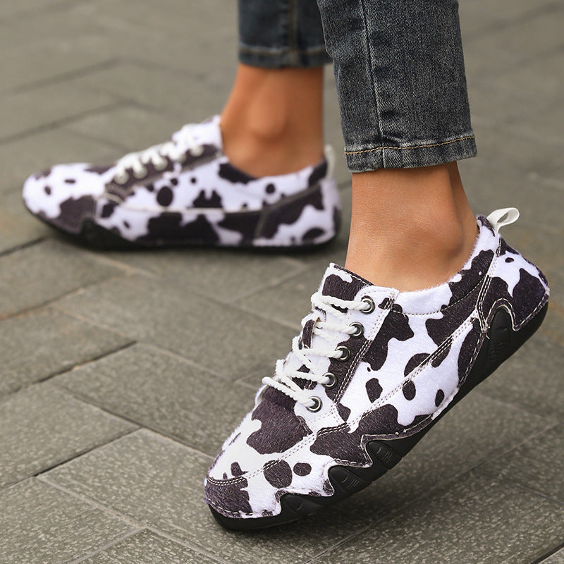 Bea Court Sneakers in Black cow print — lace-up sneaker with cushioned footbed