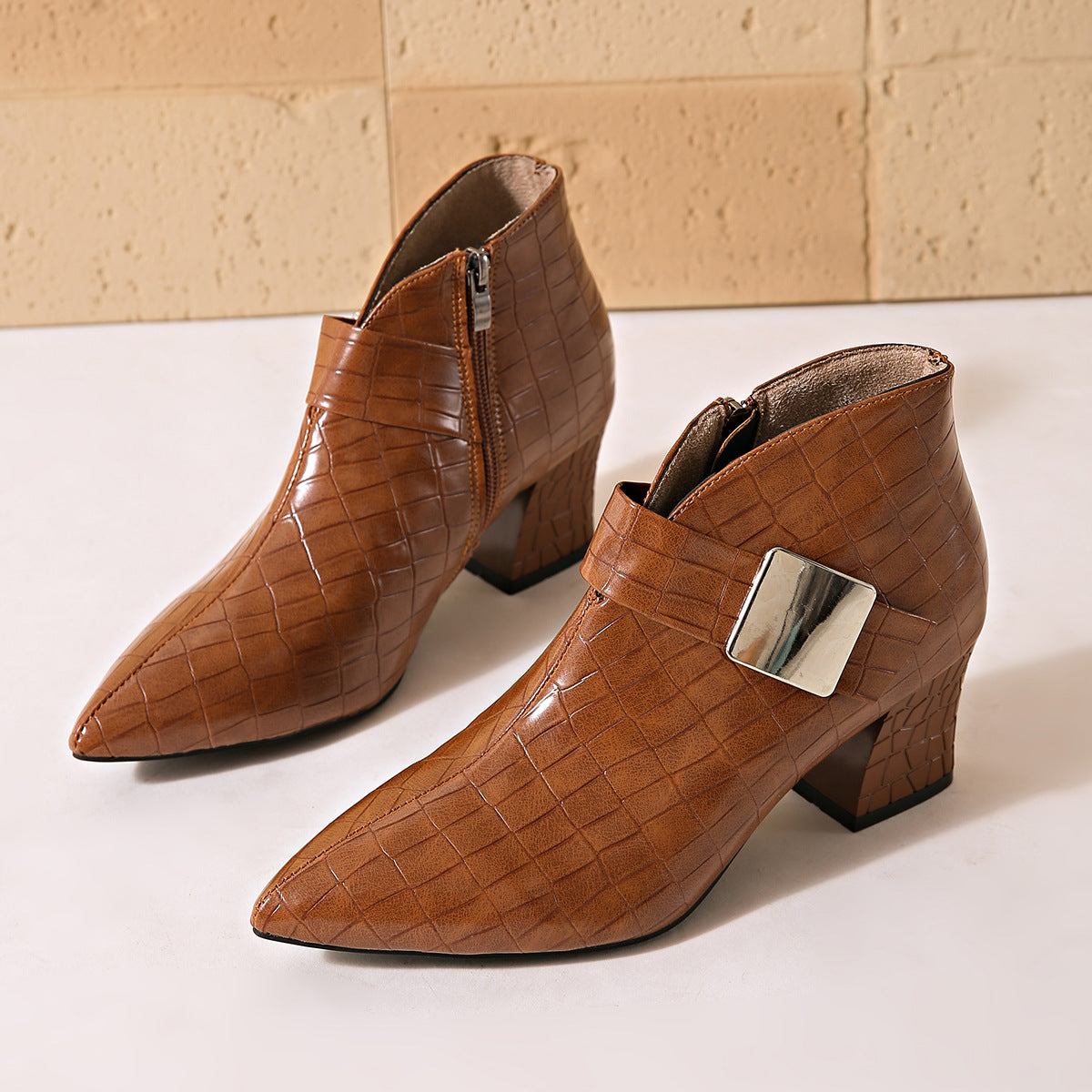 Scarlett Pointed Boots in Brown — croc-textured pointed ankle boots with a square buckle plate