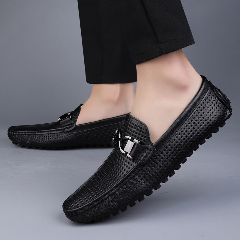 Rafferty Loafers in Black — breathable perforated driving loafers on model