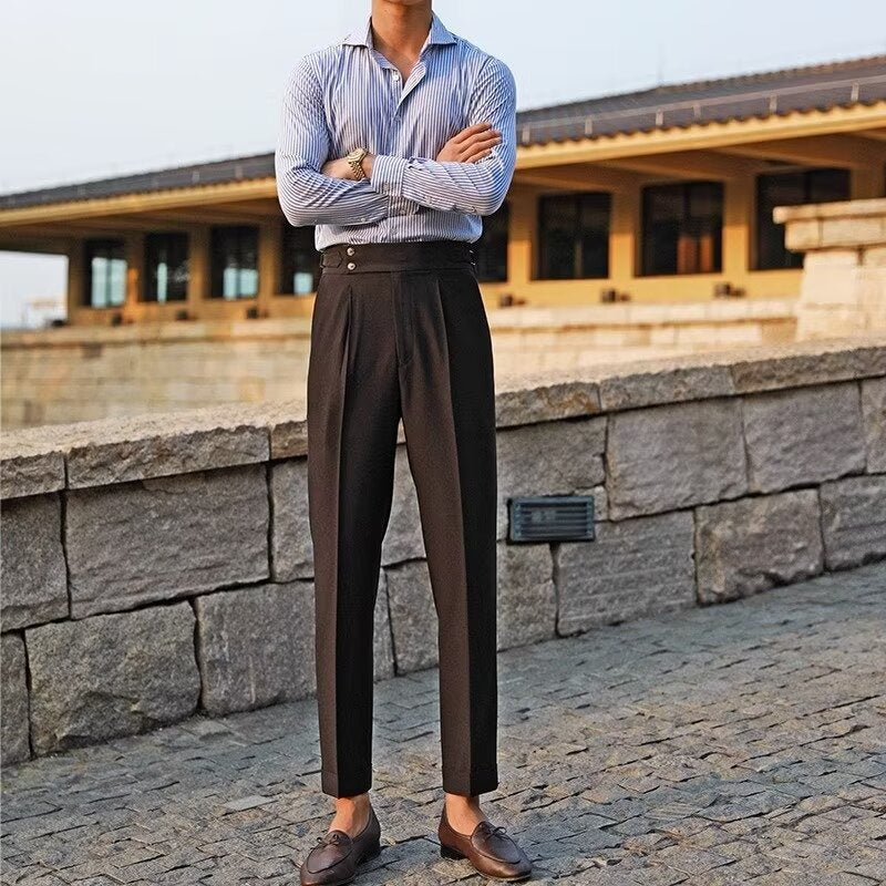 Matteo Pleated Trousers in Black — high-rise dress trousers with double pleats and side tabs