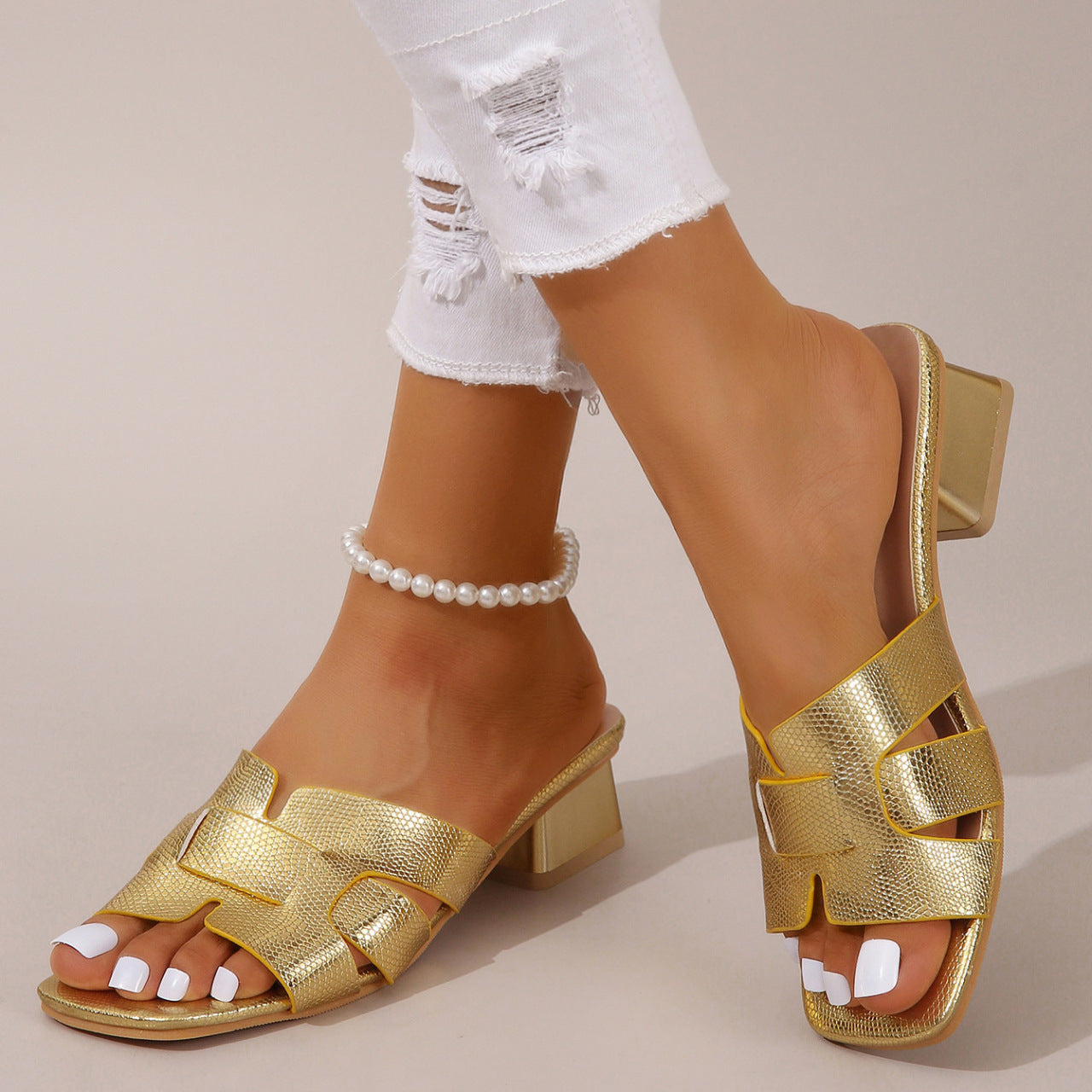 Marina H-Strap Heels in Gold — croc-embossed block-heel mule