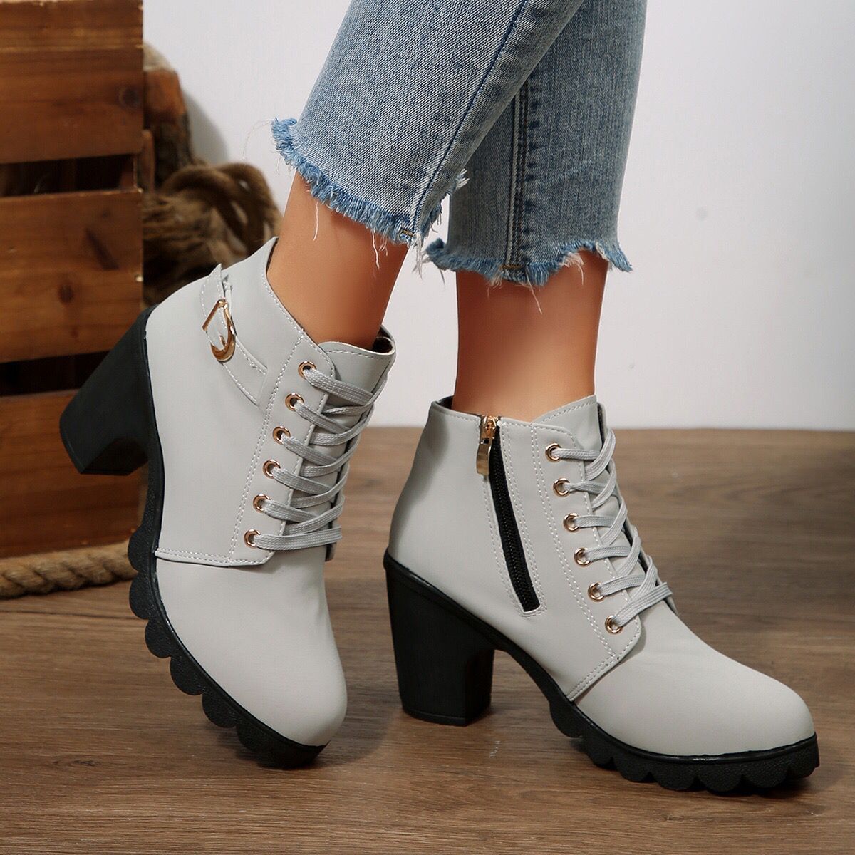Cara Platform Boots in Light Gray — worn with jeans, showing the lace-up front
