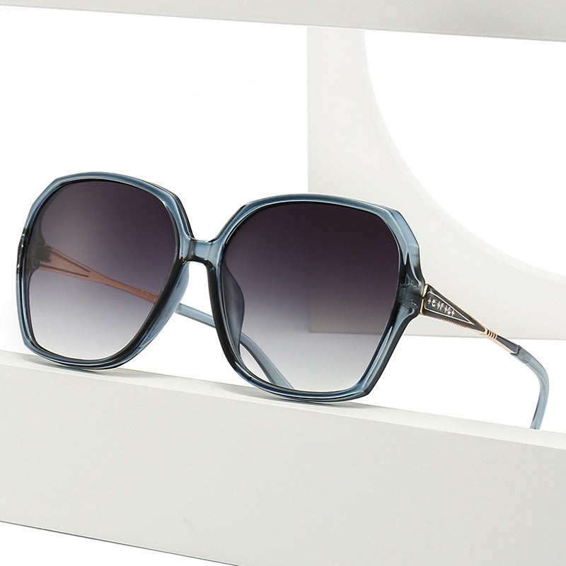 Penelope Sunglasses in Blue — Women's oversized hex acetate sunglasses with rose-gold temple detail